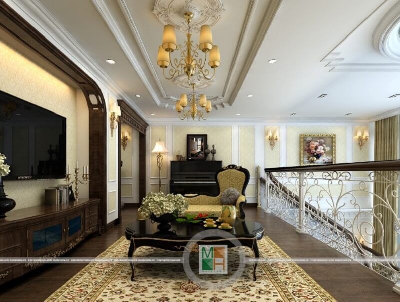 Mẫu thiết kế bàn trà tân cổ điển với kiểu dáng hình bầu dục màu đen kèm hoa tiết tinh tế mang đến điểm nhấn cho căn phòng khách.