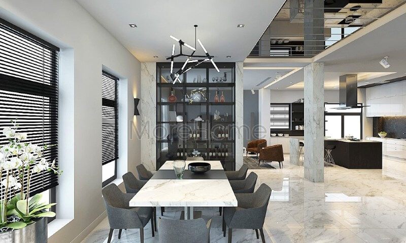.
Tủ kính đa năng được sử dụng để ngăn cách không gian phòng ăn biệt thự hiện đại với phòng khách, tạo nên một không gian riêng tư và thoải mái cho người dùng.